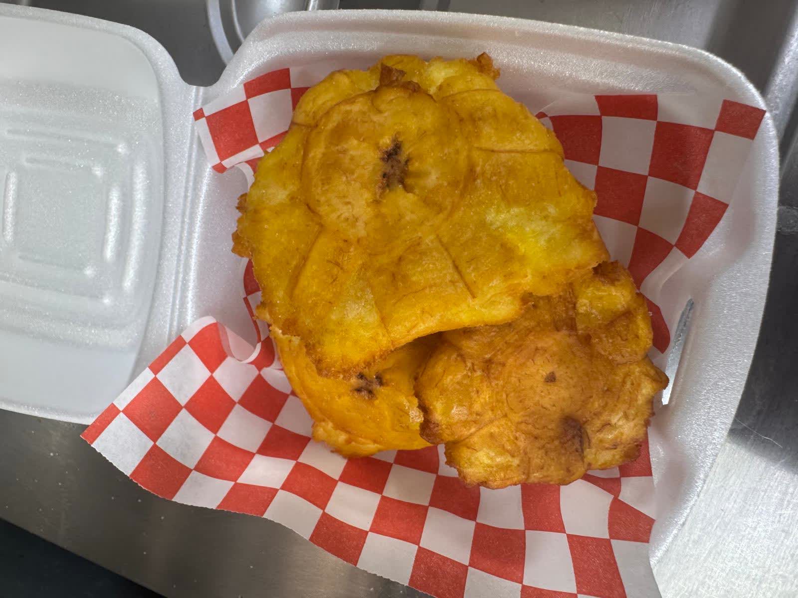 Crispy golden tostones (twice-fried green plantains)