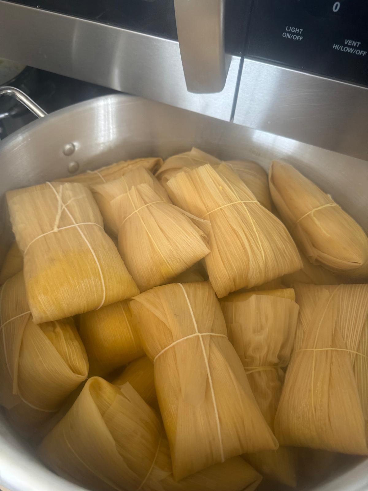 Cuban food truck serving tamales and sandwiches
