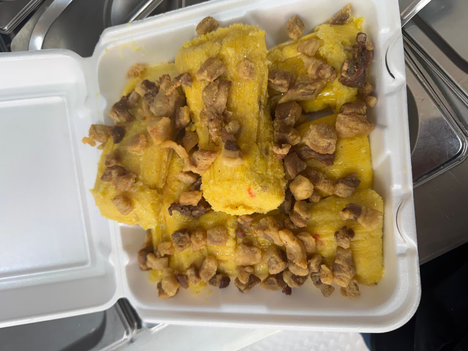 Cuban tamales topped with crispy pork cracklings